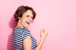 Closeup profile photo of pretty lady good mood raise fist celebrating successful sports game match ending wear casual white blue striped t-shirt isolated pastel pink color background