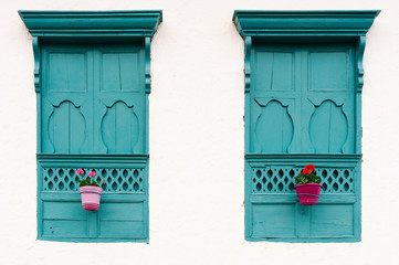 Two turquoise blue windows