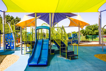 Colorful Canopies Covering Children's Playground Equipment