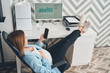 © Viacheslav Yakobchuk - Elegant pregnant woman using cellphone at work