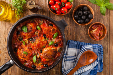 Wall Mural - Traditionally made chicken in tomato sauce cacciatore.