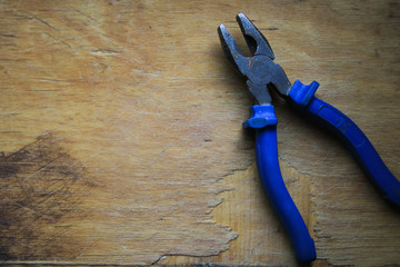 Old tools on a wooden board