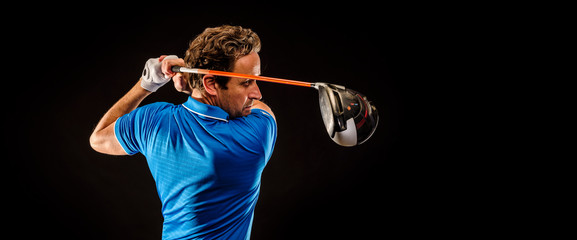 Wall Mural - Portrait of a golf player perfecting the swing isolated on dark background, banner image