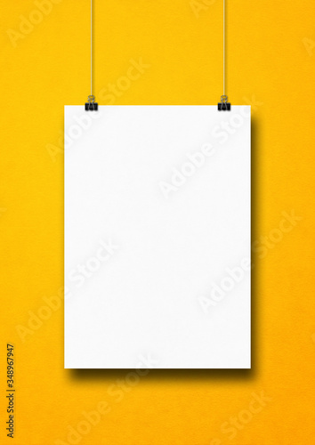 Fotomural White poster hanging on a yellow wall with clips