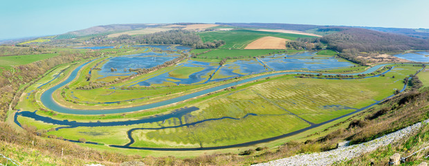 Wall Mural - Panoramic views of Cucmere river near Seaford and Eastbourne, East Sussex from High and Over, footpath leading to Cuckmere Haven and Hope Gap beaches, country walks, selective focus