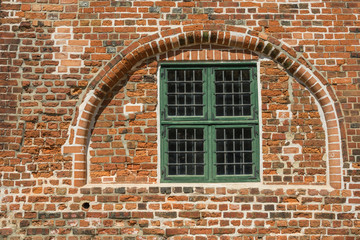 Wall Mural - window in the old brick wall