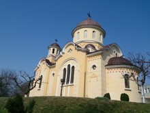 Low Angle View Of Church Against Blue Sky