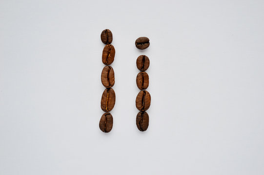 letters i made of coffee beans on the white background