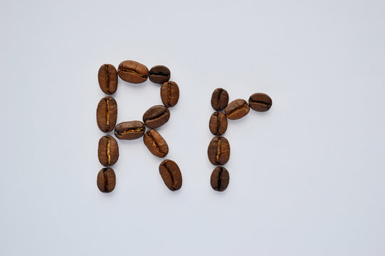 letters r made of coffee beans on the white background