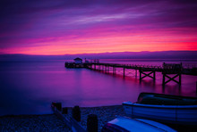 Old Pier In Totland Bay At The Isle Of Wight By Night, UK