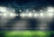 Football Stadium With The Stands Full Of Fans Waiting For The Night Game. 3D Rendering