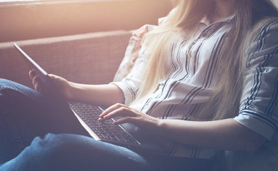 Fototapete - 
Businesswoman looking for a new job with the help of a laptop.