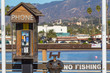 Old wooden phone booth on Stearns Wharf in Santa Barbara, California.