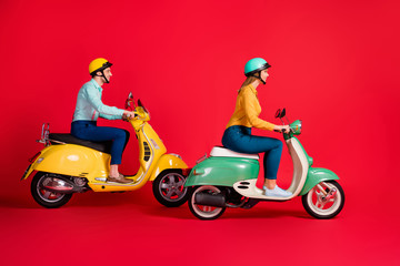 Sticker - Profile side view of her she his he nice attractive cheerful cheery couple tourists riding moped traveling city tour isolated on bright vivid shine vibrant red color background