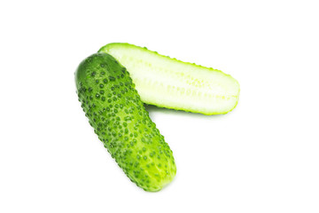 Fresh cut cucumber isolated on white background. Two halves of a cucumber.