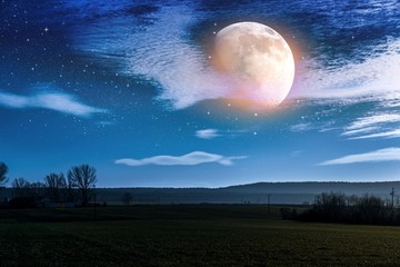 Wall Mural - the cloud landscape of the countryside. night sky and bright moon.