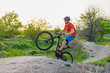 © mihakonceptcorn - Extreme cycling concept, cyclist jumping on a mountain bike.
