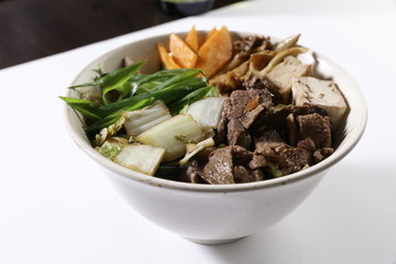 Bowl with vegetables, mushrooms and beef