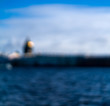 © Alex - blurred bokeh background on the river and city in out of focus
