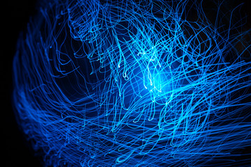 Wall Mural - blue abstract particles and lines with bokeh and blur in dark background