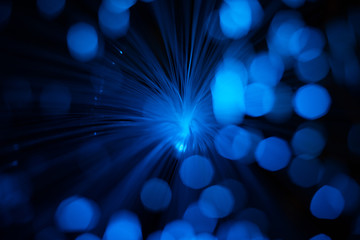 Wall Mural - blue abstract round bokeh and blur in dark background