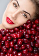 © Svetlana Fedoseeva - Beautiful woman with red berries. Woman with a sweet cherry. Juicy cherries.