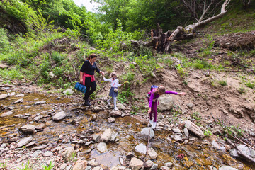 Wall Mural - Family Enjoy Nature, Hiking, People, Stream,Spring