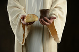 Fototapeta Sport - Jesus holding the bread and the wine