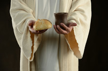 Jesus Holding The Bread And The Wine