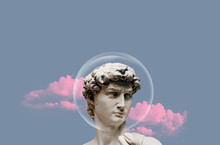Statue On A Background Of Clouds. Statue Art. Pink Clouds