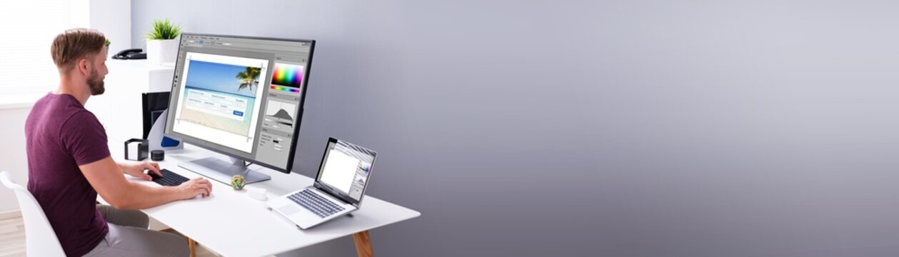 Designer Editing Photo On Computer