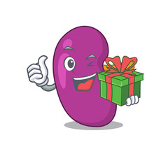 Wall Mural - joyful kidney cartoon character with a big gift box