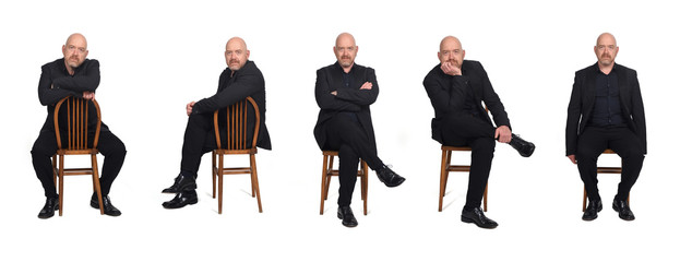 Wall Mural - same man sitting with a chair on white background, side view