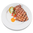 Dish of grilled Iberian pork secreto with baked potatoes