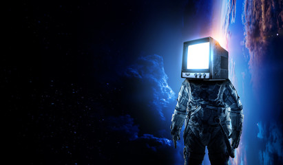 Wall Mural - astronaut with tv head in space. mixed media.
