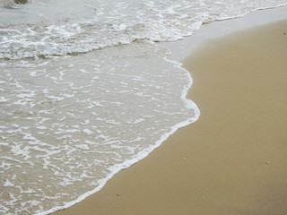 Poster - wave of the sea on sand beach