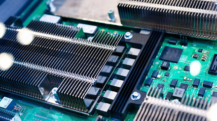 Poster - closeup macro on an computer motherboard metal coolers with colorful mood, all logos and trademarks were cloned out.