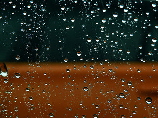 Wall Mural - Drops of water on the car glass after rain