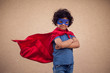 © Aleksej - A portrait of kid boy in costume of superhero. Childhood and success concept