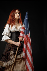 Wall Mural - Girl in historic dress from United States Revolutionary War with flag. July 4th, Independence Day USA Concept Photo Composition