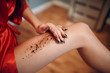 © primipil - Scrub for legs. Woman cosmetics,