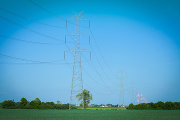 High voltage transmission line against clear blue sky