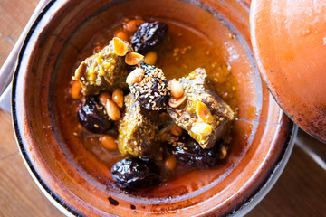 Wall Mural - Beef tagine with prunes, almonds and sesame seeds 