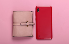 Smartphone With Leather Wallet On Pink Pastel  Background. Top View