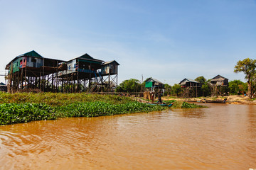 Tonle SAP, Cambodia - February 2014: Kampong Phluk village during drought season. Life and work of residents of Cambodian village on water, near Siem Reap, Cambodia