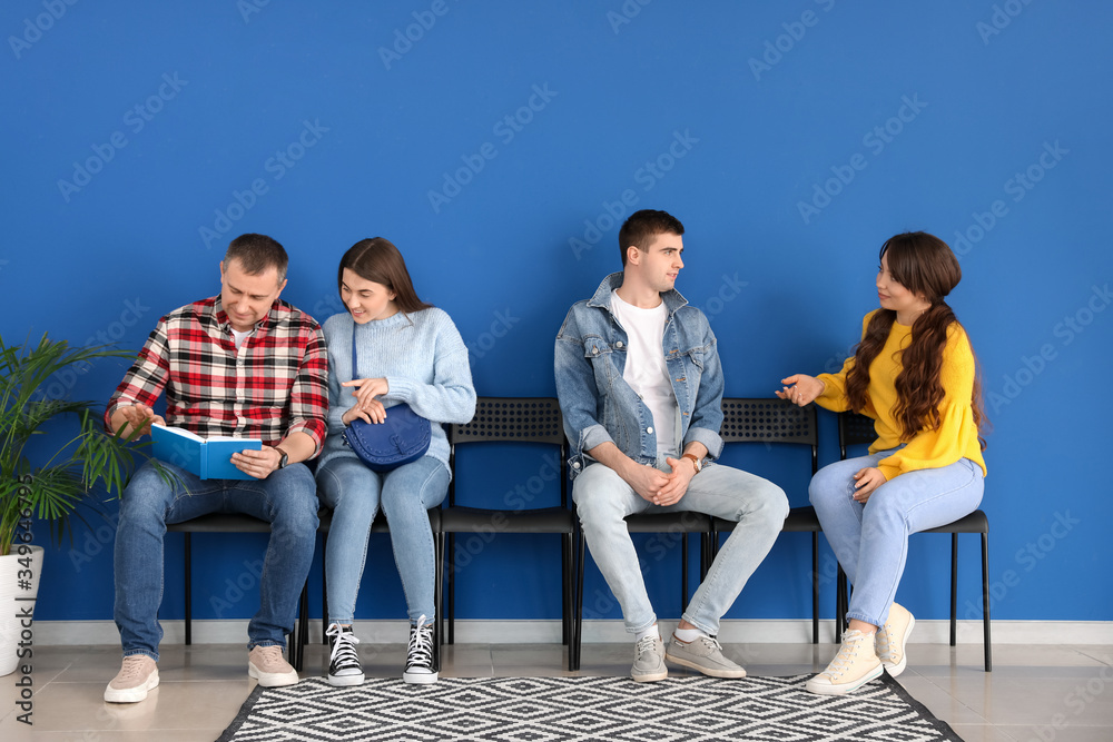 People waiting in line indoors