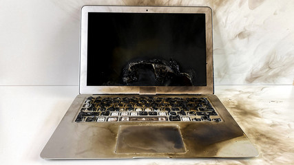 overheating laptop - burned keyboard and pealing screen