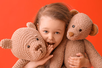 Poster - Little girl with toys on color background