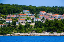 Cottages Near The Village Of Bol On The Island Of Brac In Croatia - Pine Forest On The Slopes Plunging Into The Adriatic Sea