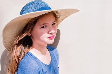 Close up portrait of a brunette girl in summer on summer time